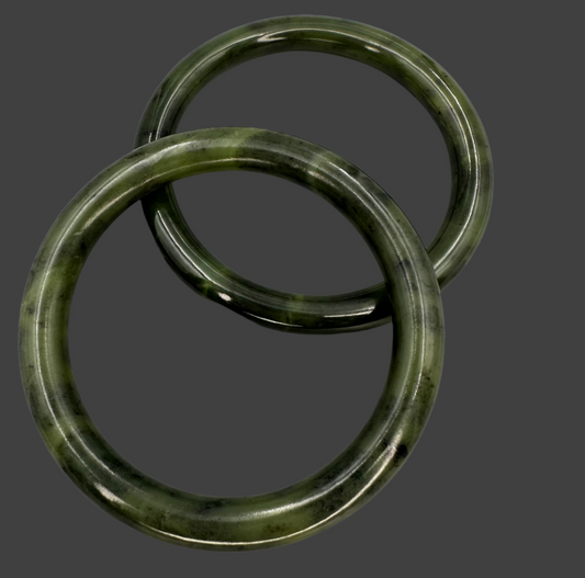 Pair of solid dark green Jade bangle bracelets